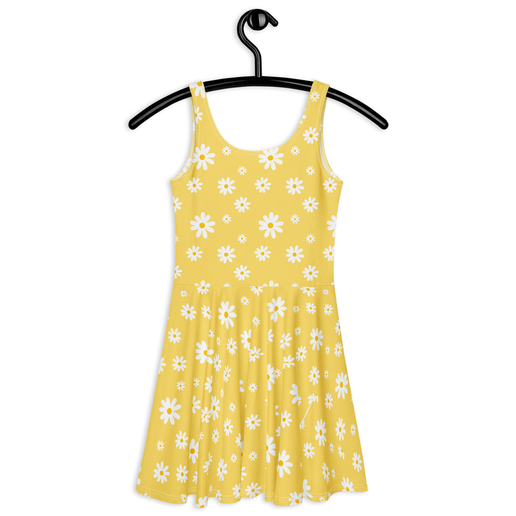 Women’s yellow sleeveless daisy skater dress with buttery soft fabric and upf 50 plus hanging on black hanger