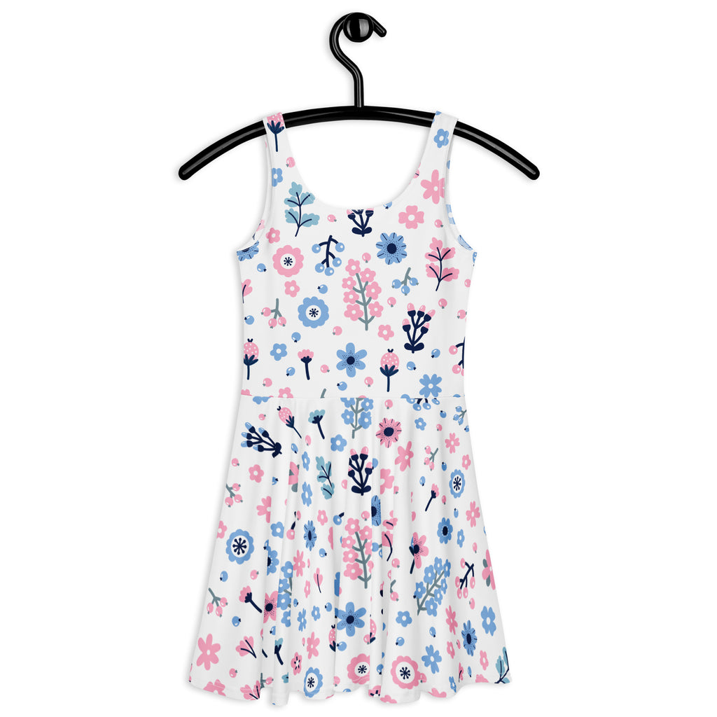 Women’s floral buttery soft white sleeveless skater dress with purple and blue flowers and upf 50 plus protection