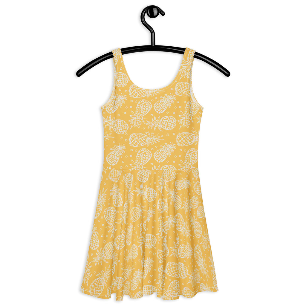 Women’s yellow pineapple buttery soft skater dress with upf 50 plus featuring sleeveless flared skirt and white line art detailing