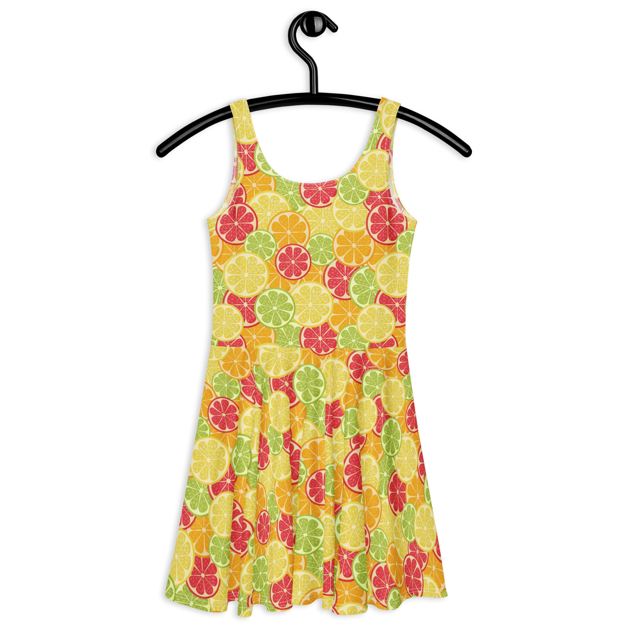 A vibrant yellow womens citrus fruit buttery soft skater dress with upf 50 plus featuring sliced lemon lime and grapefruit patterns