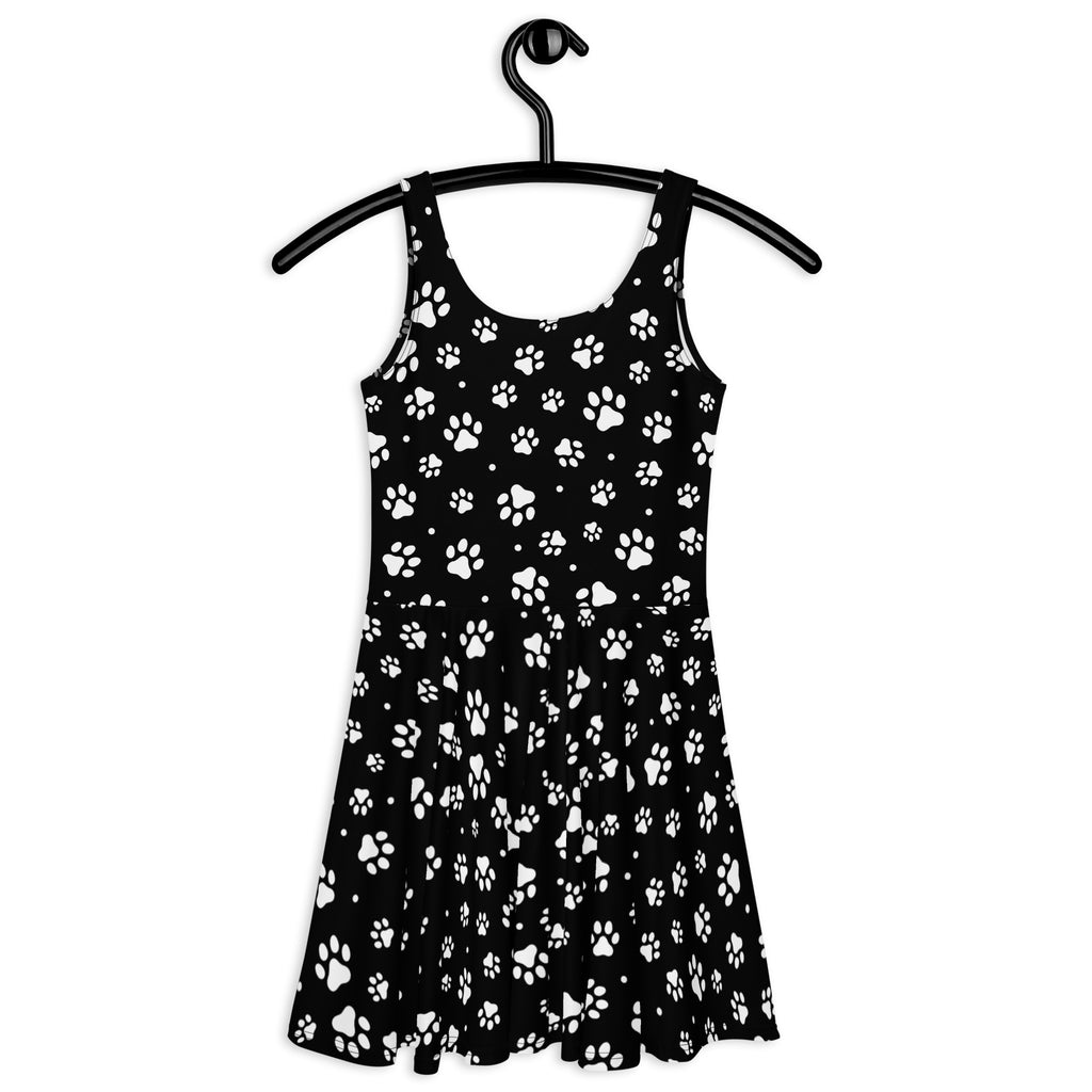 Black sleeveless flared skater dress with white paw print pattern buttery soft fabric and upf 50 plus protection