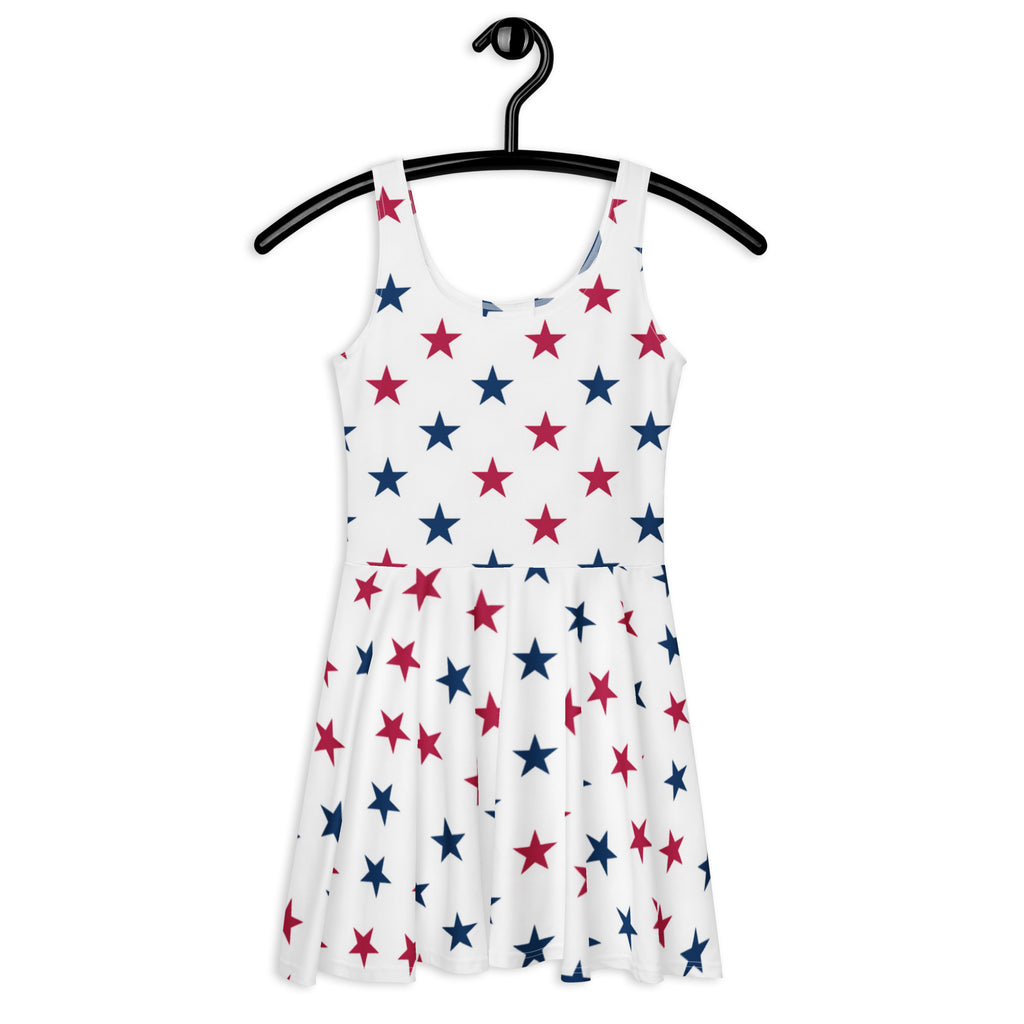 Women’s white sleeveless buttery soft skater dress with red and blue star pattern and upf 50 plus protection