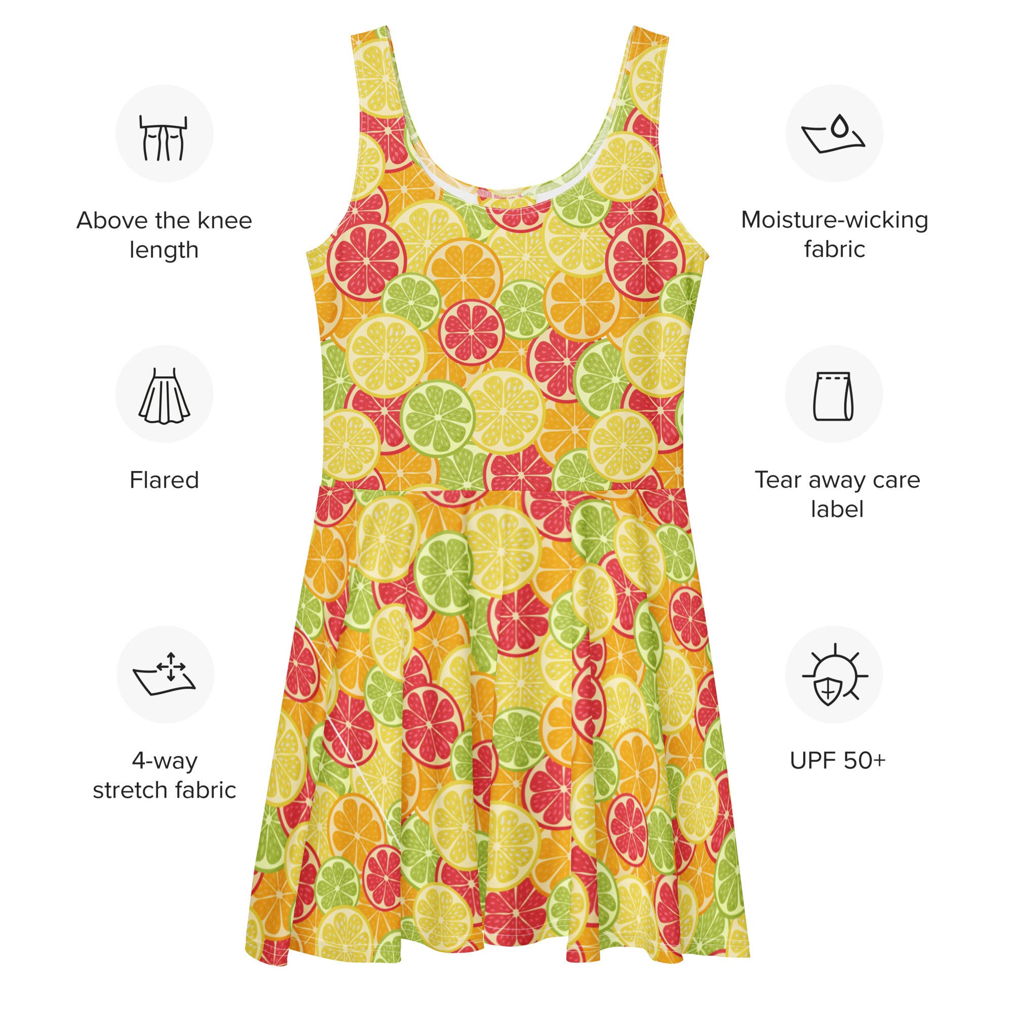 A vibrant yellow women’s skater dress with buttery soft fabric and colorful citrus fruit pattern with upf 50+ protection