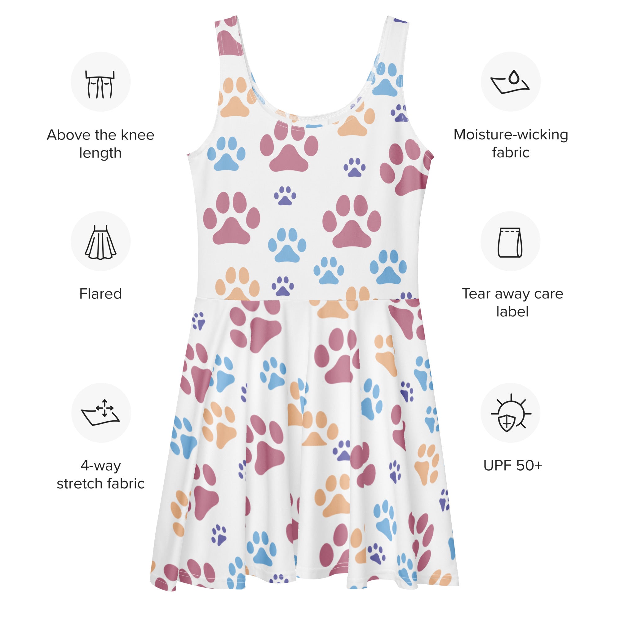 White above the knee skater dress with colorful paw prints in pink blue and orange buttery soft fabric and UPF 50+