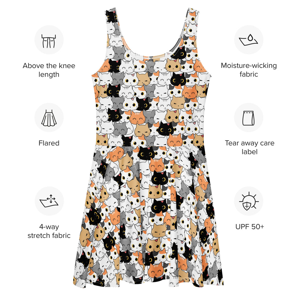 A white sleeveless buttery soft skater dress with a playful black gray and orange cartoon cat pattern and UPF 50 plus protection