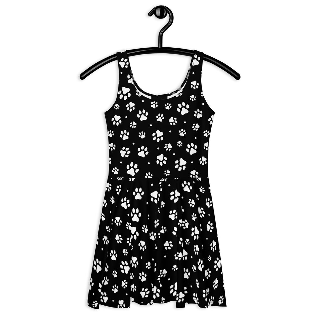 Black sleeveless womens skater dress with playful white paw print pattern buttery soft fabric and upf 50 plus protection