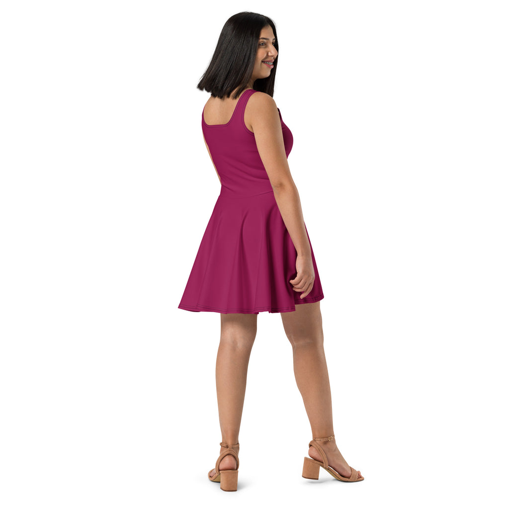 A vibrant magenta berry purple buttery soft sleeveless a-line skater dress with fitted bodice and UPF 50+ protection