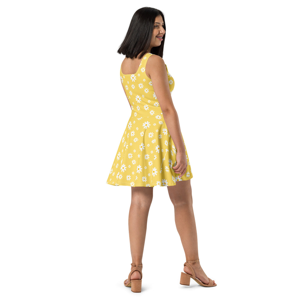 Women’s yellow daisy buttery soft sleeveless skater dress with UPF 50+ featuring white floral pattern