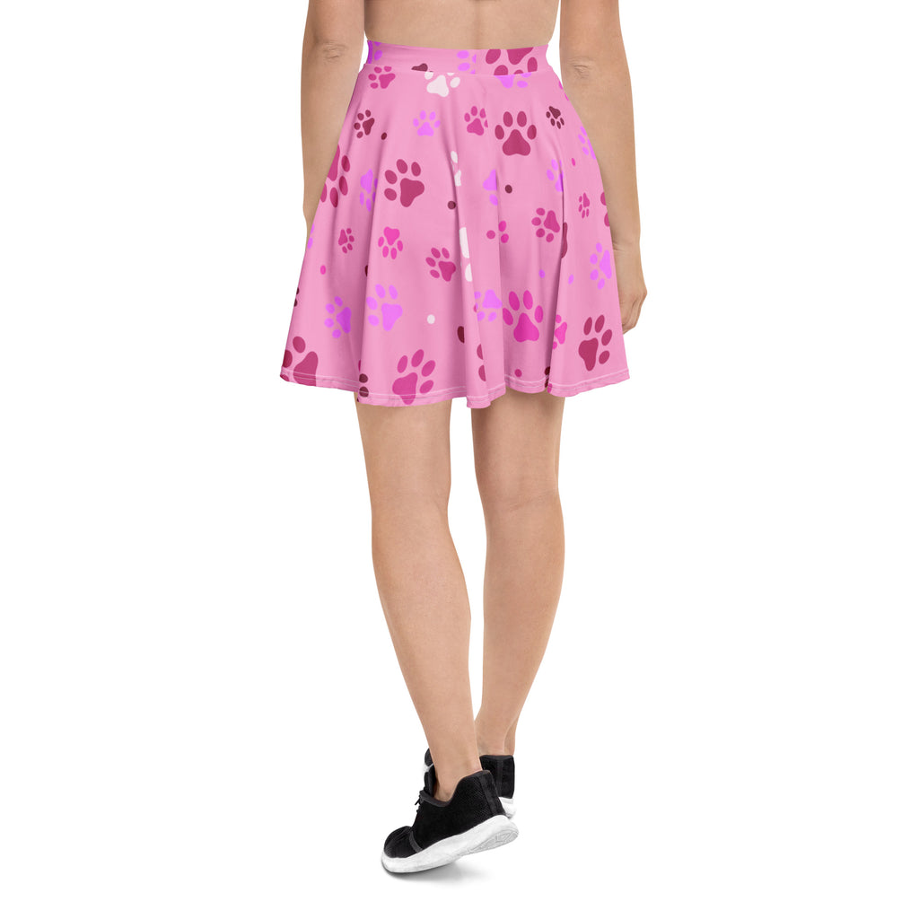 Women’s pink paw print skater skirt with playful pink and purple paw patterns flowy high waisted upf 50 recycled fabric