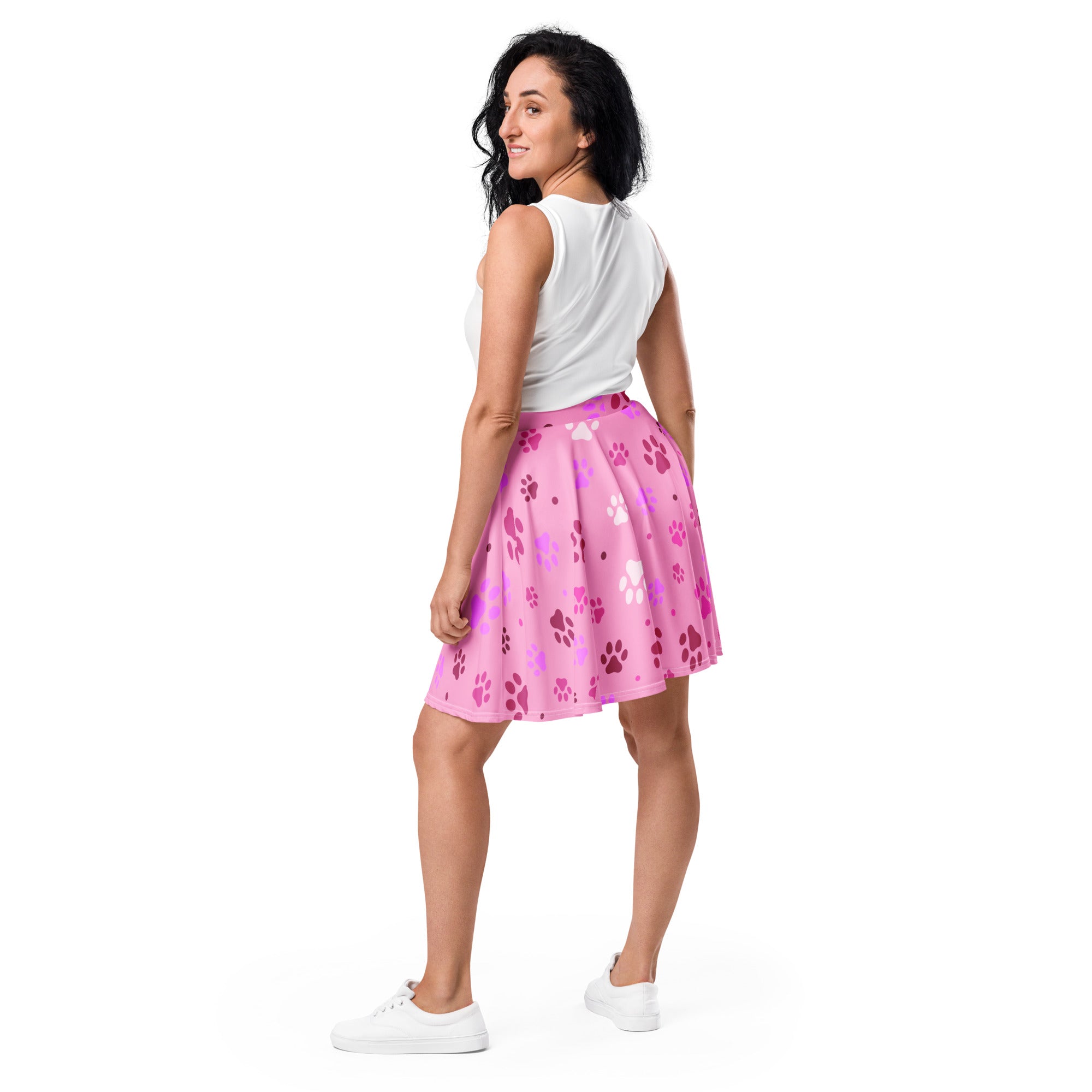 Women’s pink paw print skater skirt with playful paw pattern in shades of pink and purple flowy high waisted upf 50+ recycled fabric