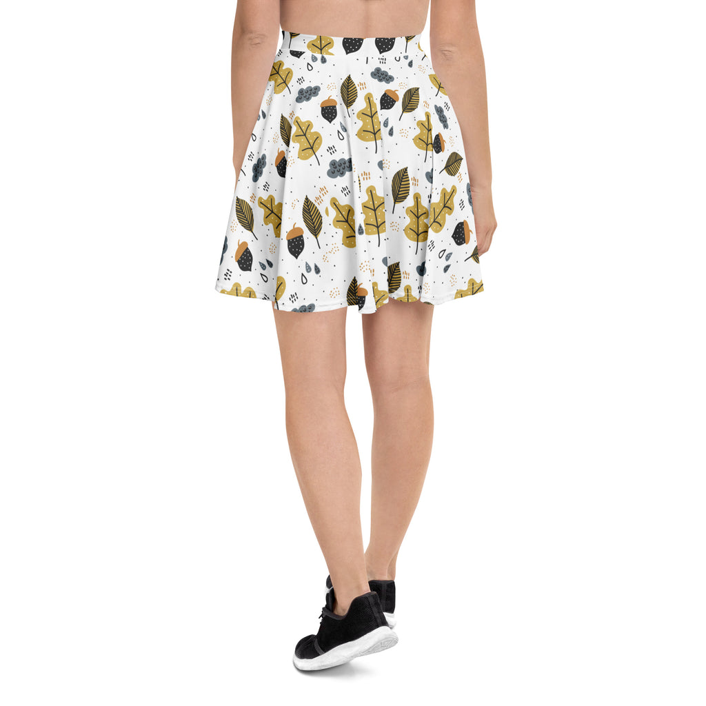 Women’s white pleated autumn themed skater skirt with mustard leaves acorns flowy high waisted UPF 50 recycled fabric