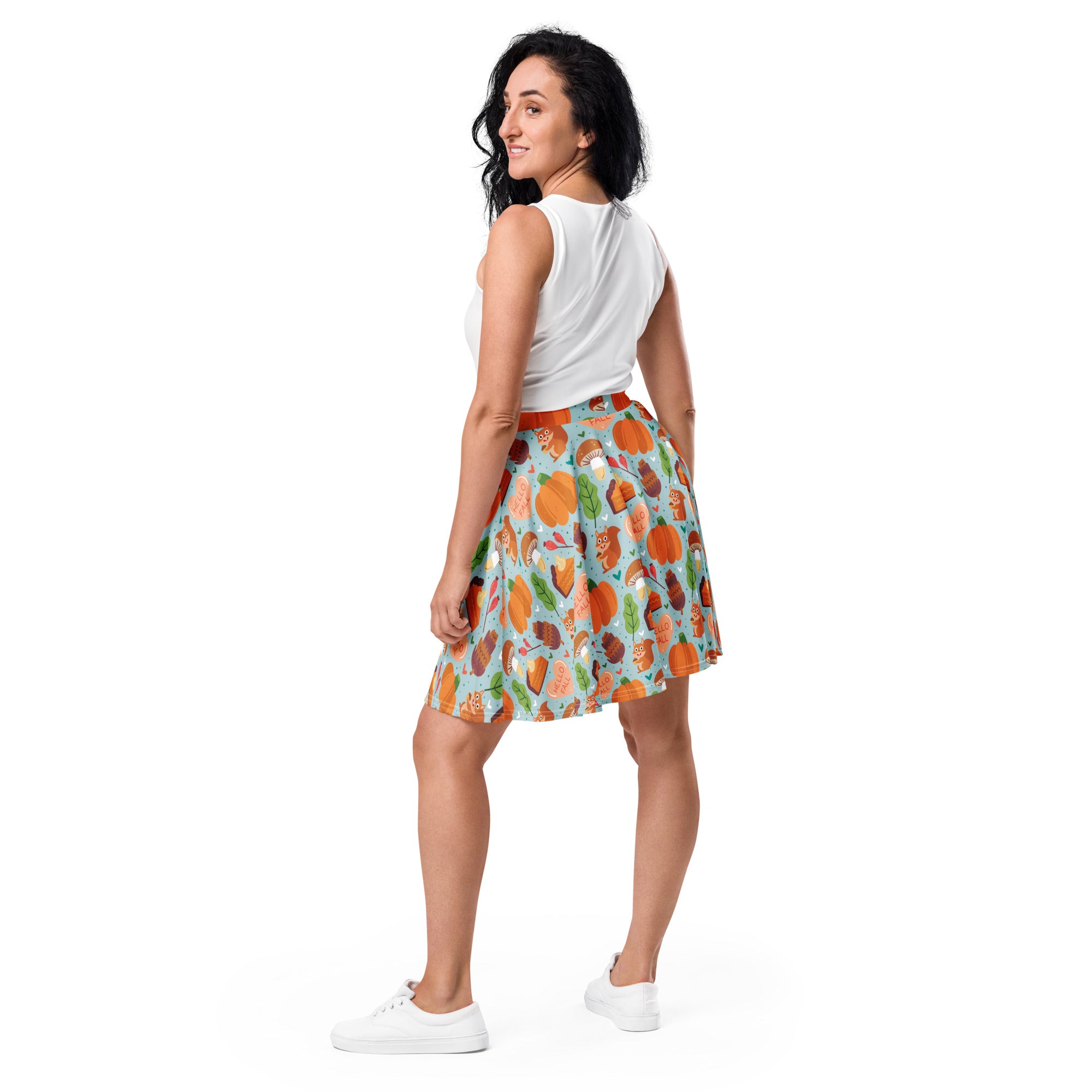 Women’s hello fall skater skirt with flared design light blue fabric playful pumpkin squirrel and leaf pattern upf 50+