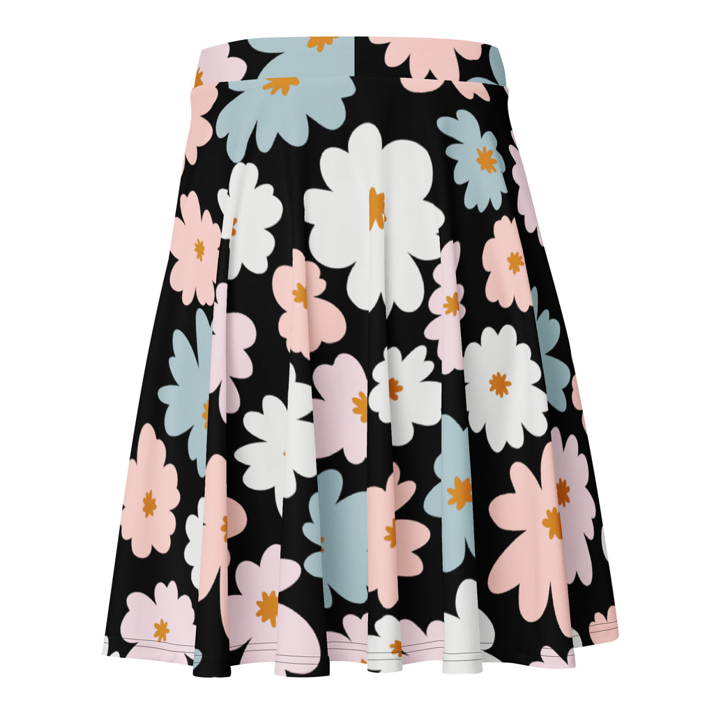 A flared black retro floral skater skirt with oversized white pink blue flowers yellow centers high waisted recycled fabric