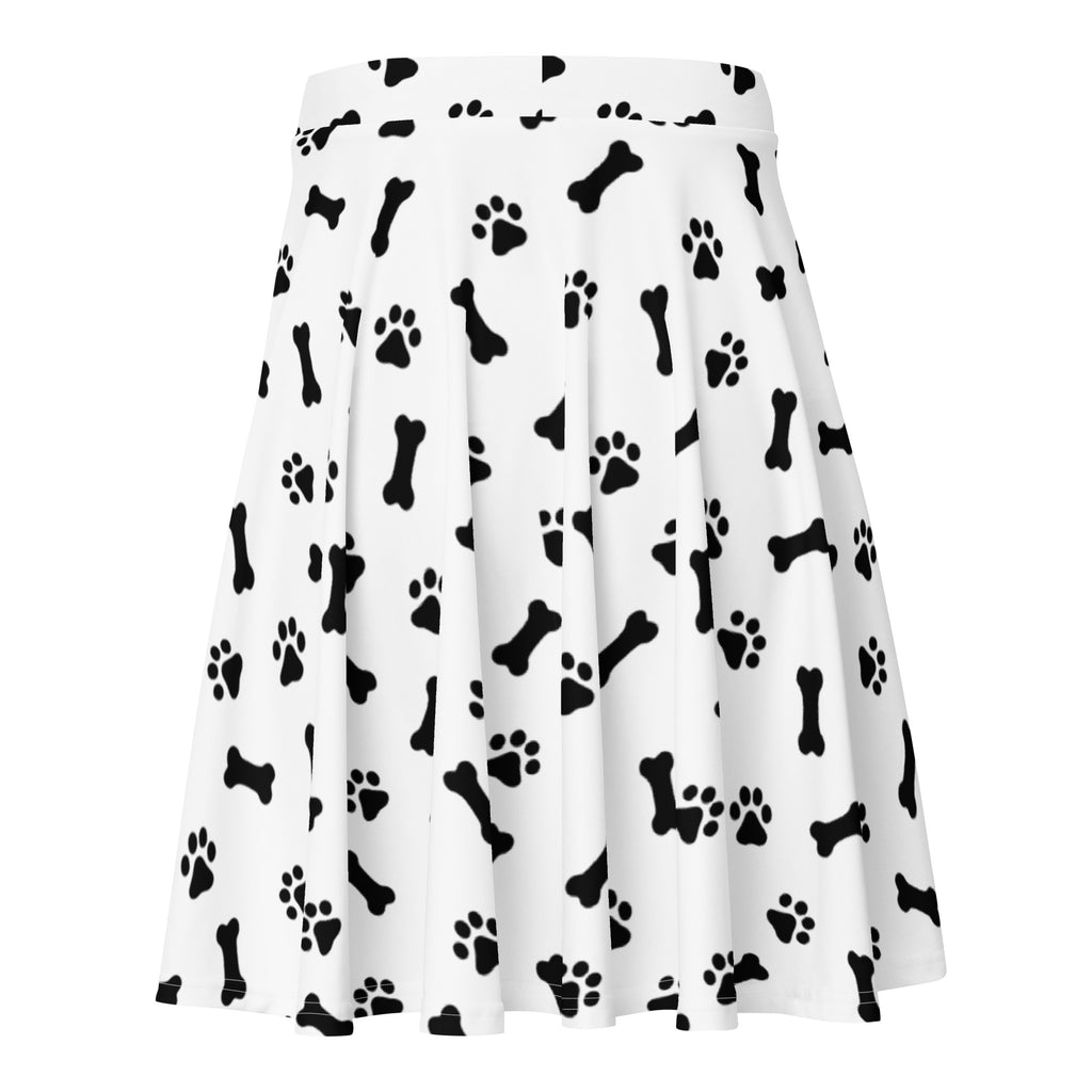 White pleated women’s skater skirt with black dog paw and bone print made from recycled fabric with upf 50+