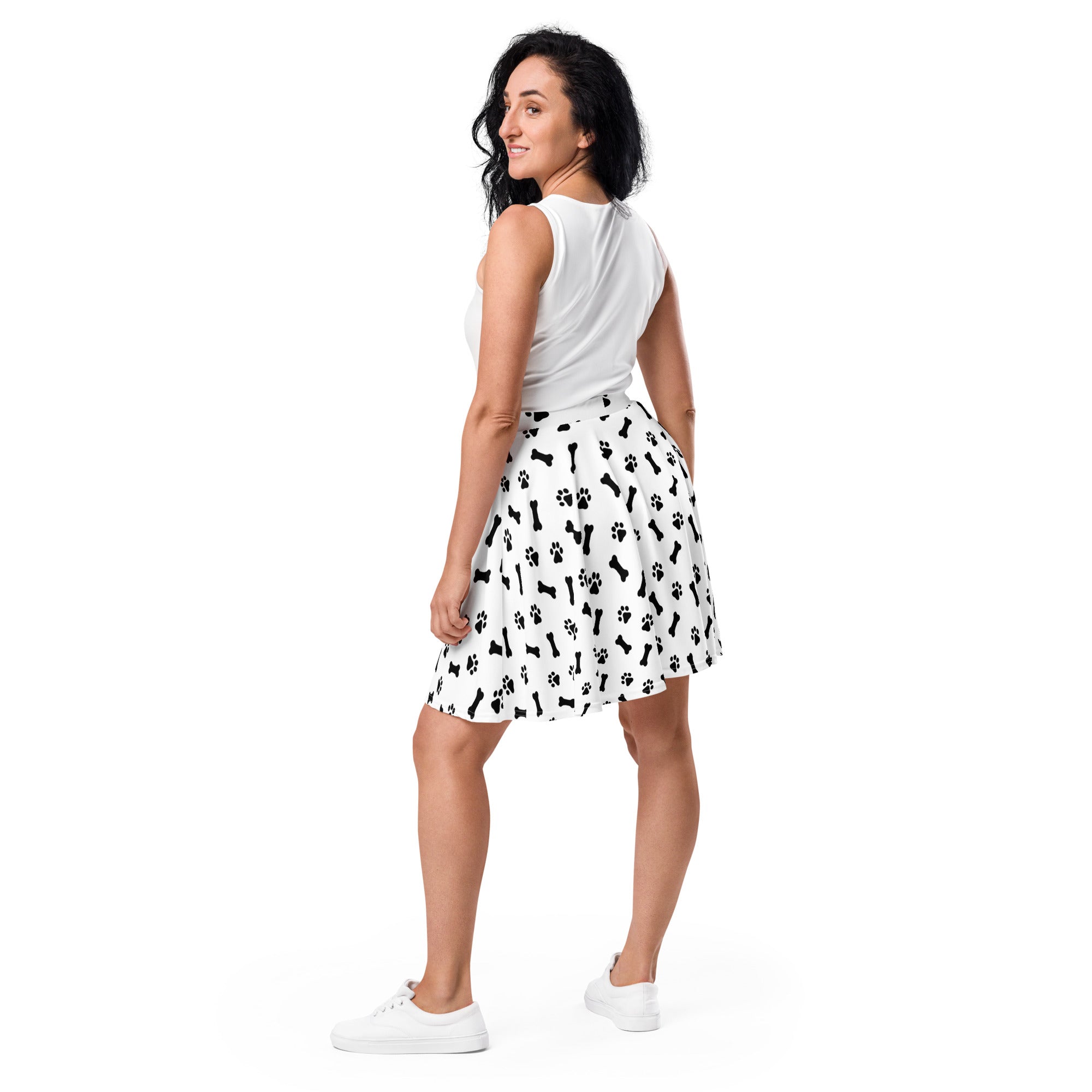 White women’s dog paw and bone skater skirt with black prints flowy high waisted recycled fabric upf 50 plus