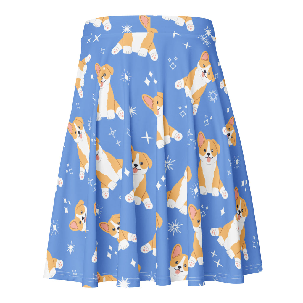 Women’s blue high waisted pleated skater skirt with cartoon tan and white corgis and starburst accents made from recycled fabric