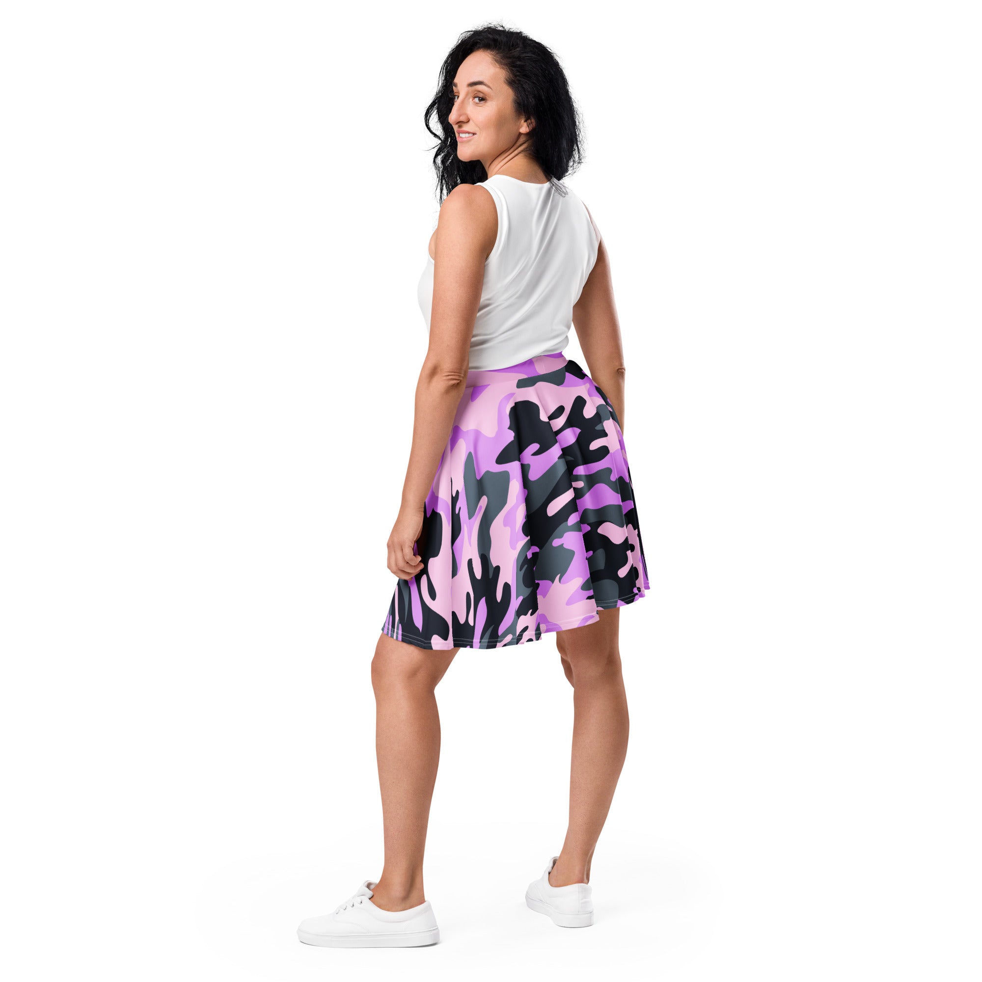 A women’s purple camouflage skater skirt with a flared design made from lightweight recycled fabric with upf 50+