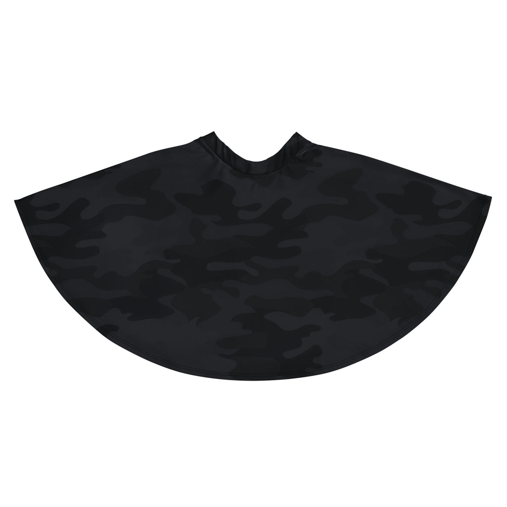 Black camouflage-patterned barber cape made from recycled fabric with durable water repellent finish and adjustable straps