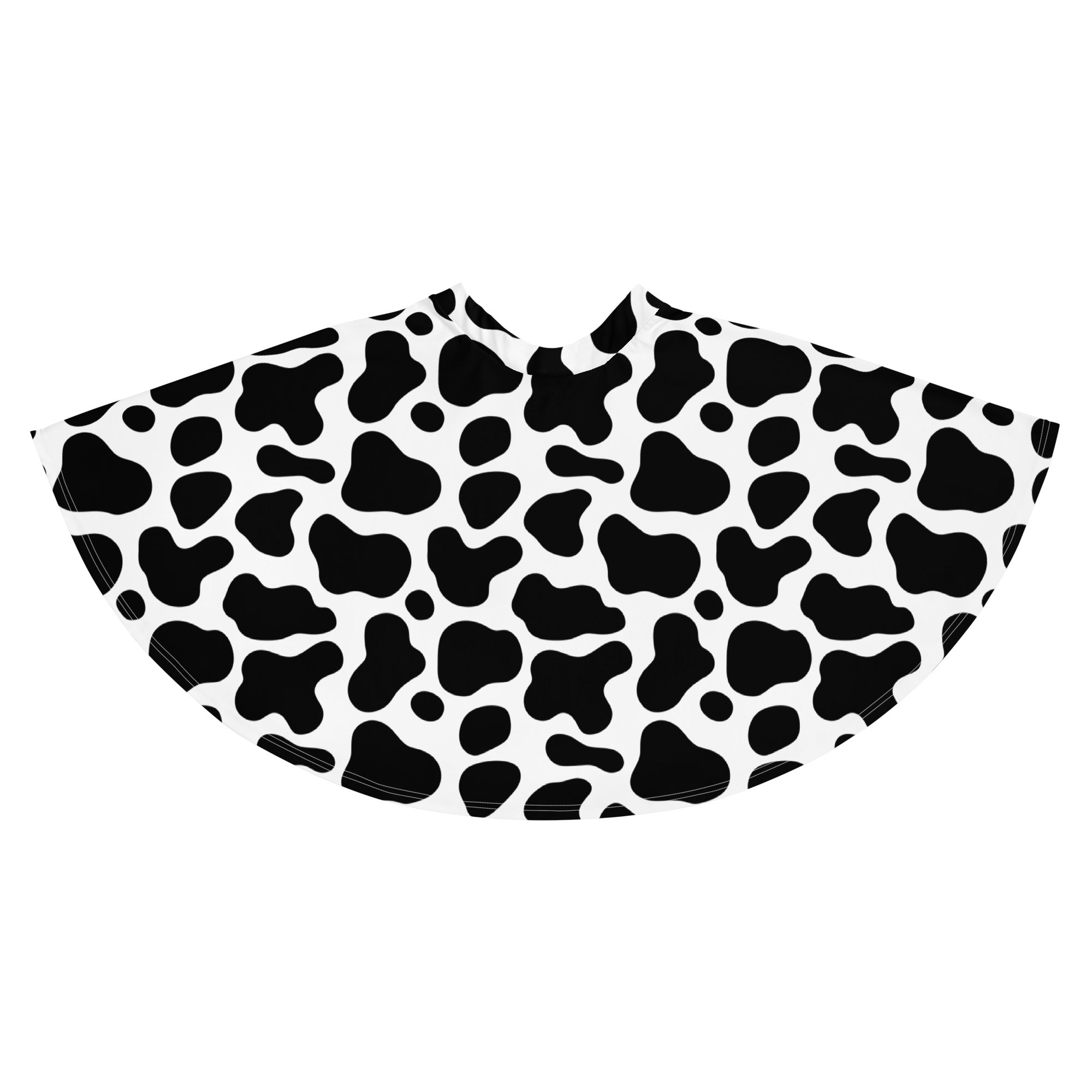 A black and white cow print women’s skater skirt with a flowy high waisted silhouette made from recycled fabric