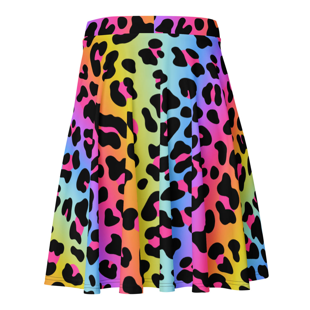 A vibrant rainbow leopard skater skirt with pleats high waisted flowy recycled fabric and upf 50 plus protection