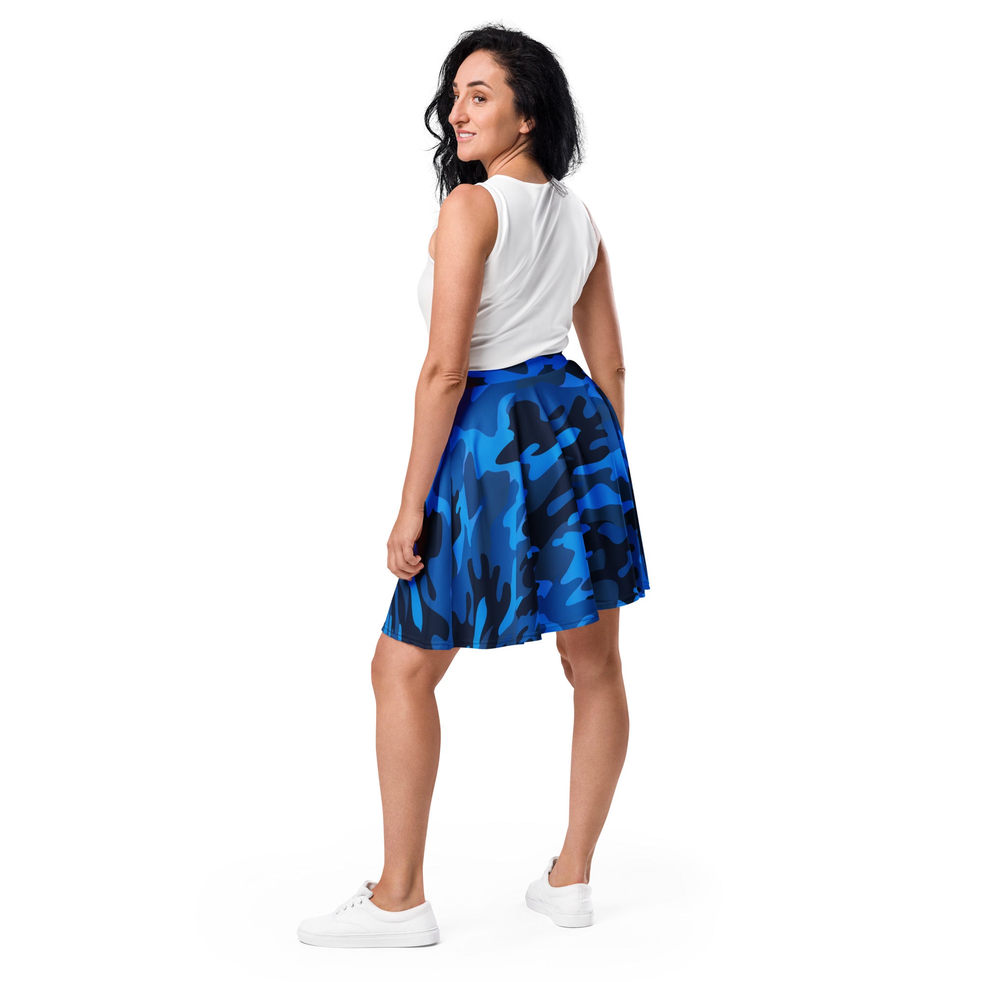 A flared blue camouflage skater skirt with a flowing a-line silhouette made from recycled fabric with upf 50+