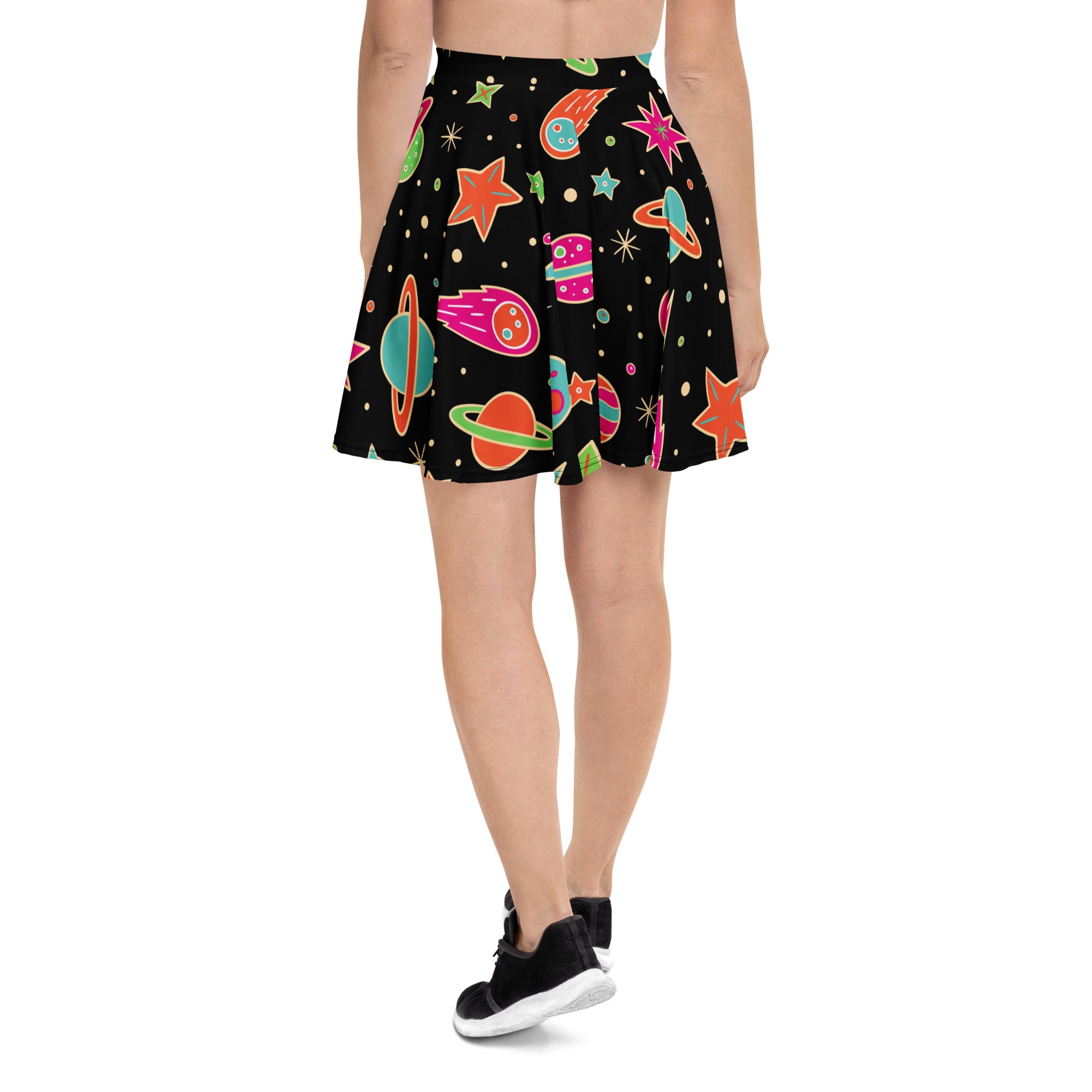 Black pleated women’s retro space skater skirt with vibrant cosmic pattern in neon colors made from recycled fabric
