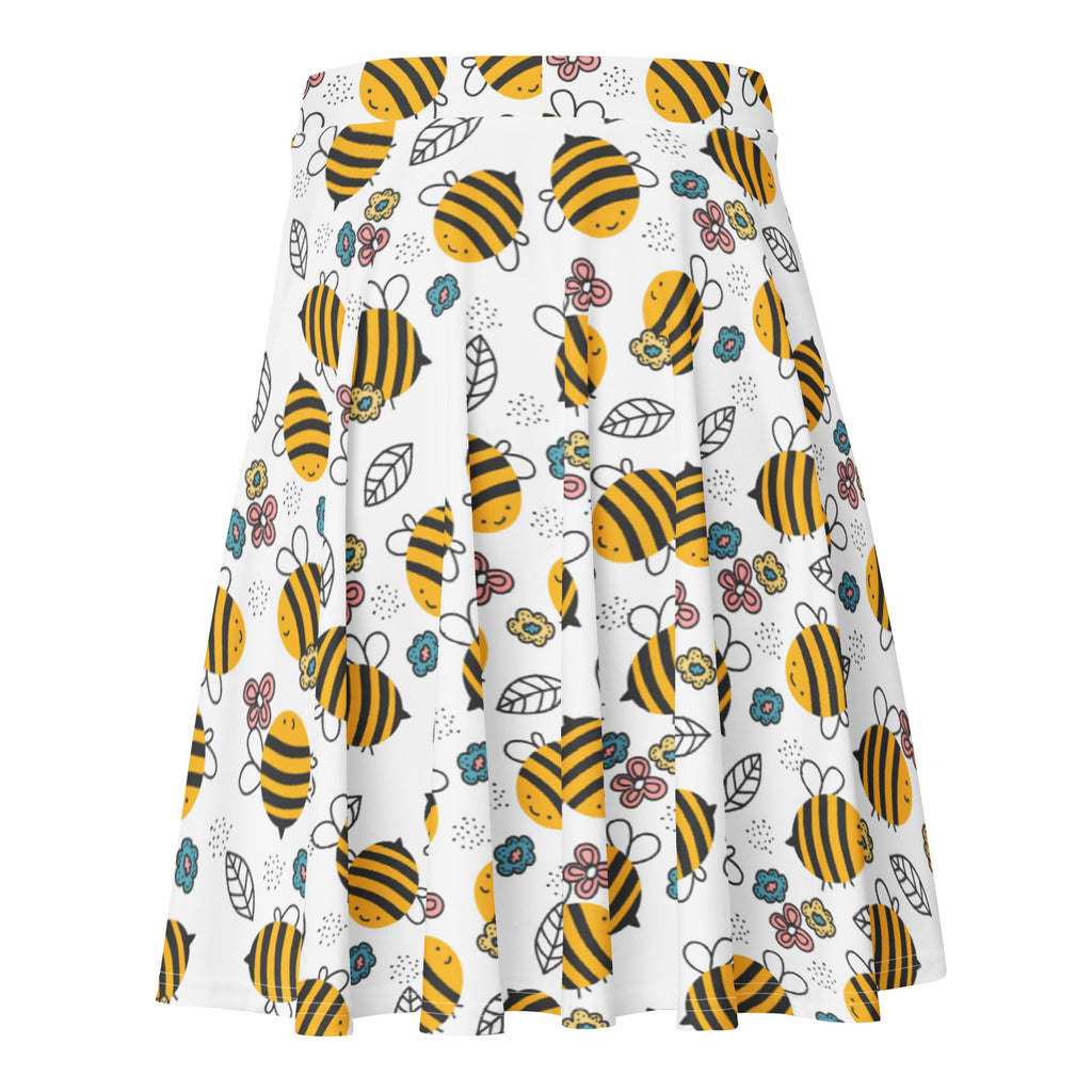 White pleated skater skirt with yellow bumblebee pattern colorful flowers green leaves flowy high waisted recycled fabric