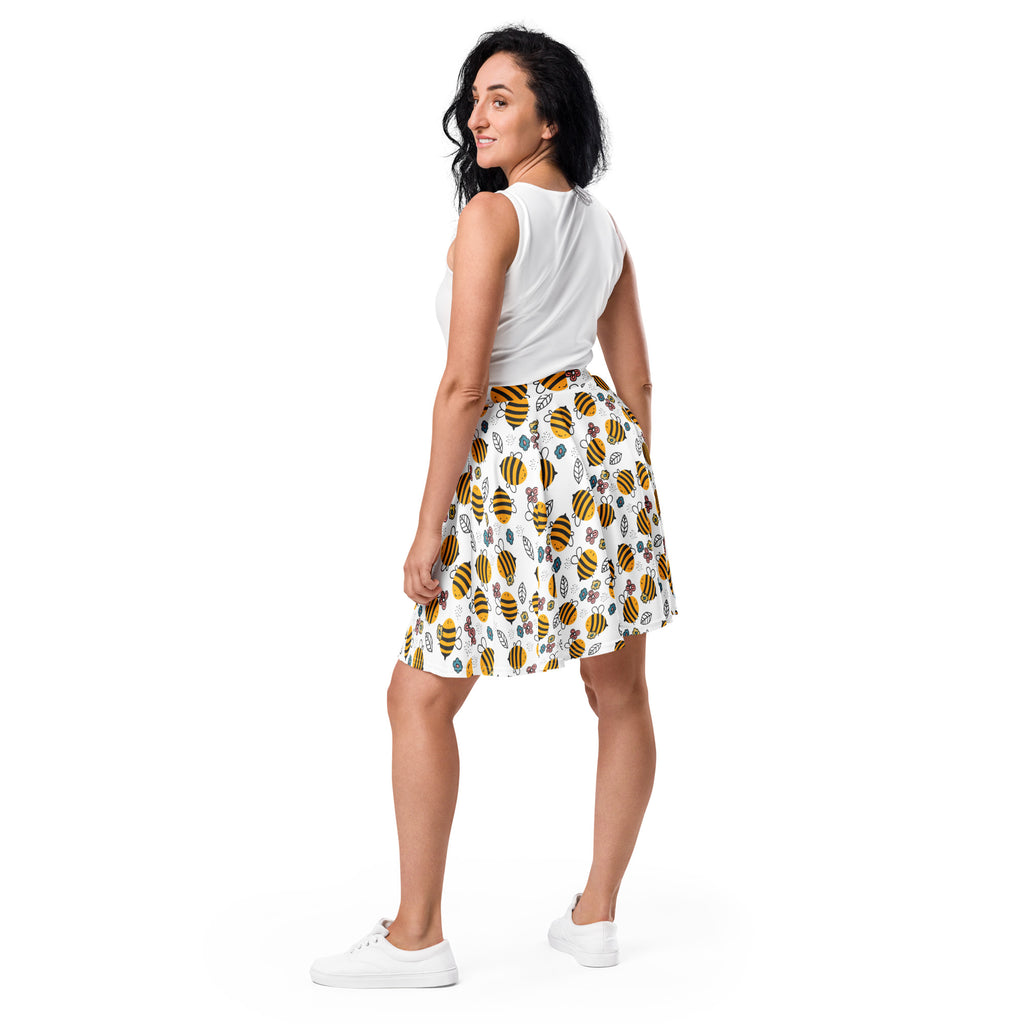 White floral yellow bumblebee skater skirt with green leaves blue flowers flowy high waisted upf 50 plus recycled fabric