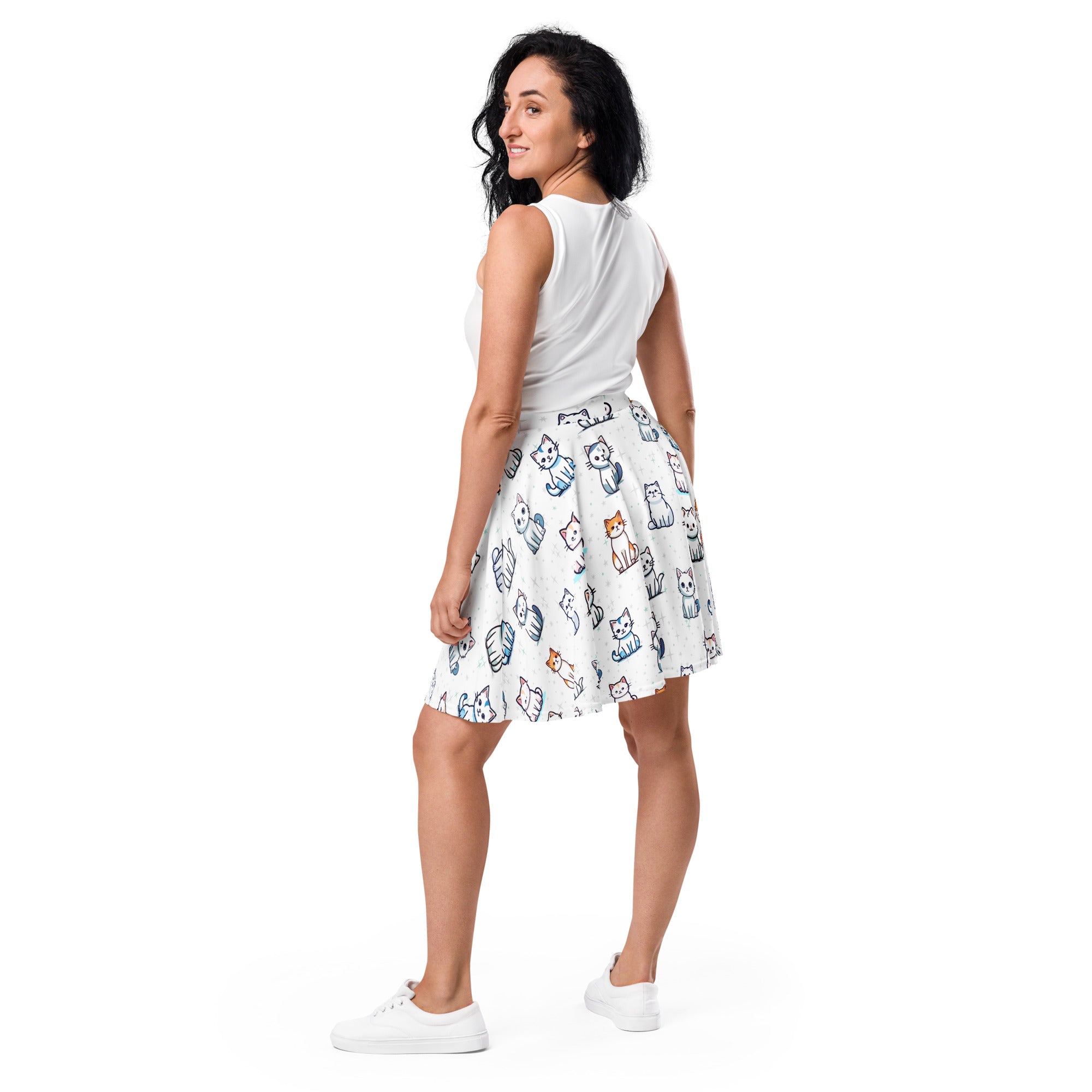 White cat print skater skirt featuring colorful cartoon cats, flowy high waisted design with upf 50+ and recycled fabric