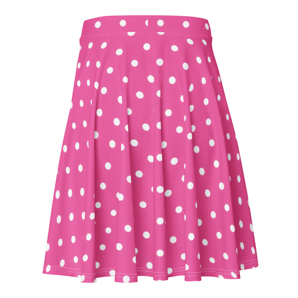 A vibrant pink high waisted skater skirt with white polka dots made from recycled fabric and UPF 50+ protection