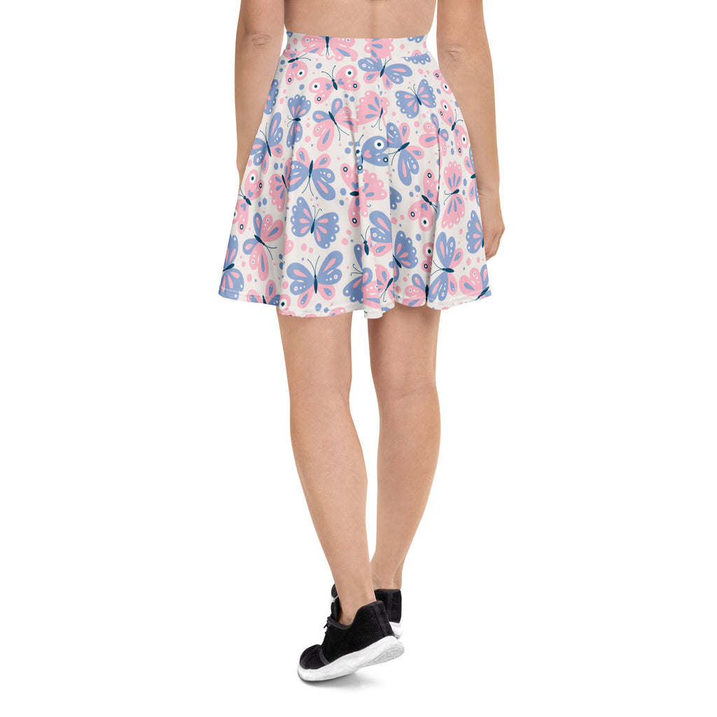 Women’s butterfly print skater skirt with pink and blue butterflies on light recycled fabric and UPF 50 plus protection