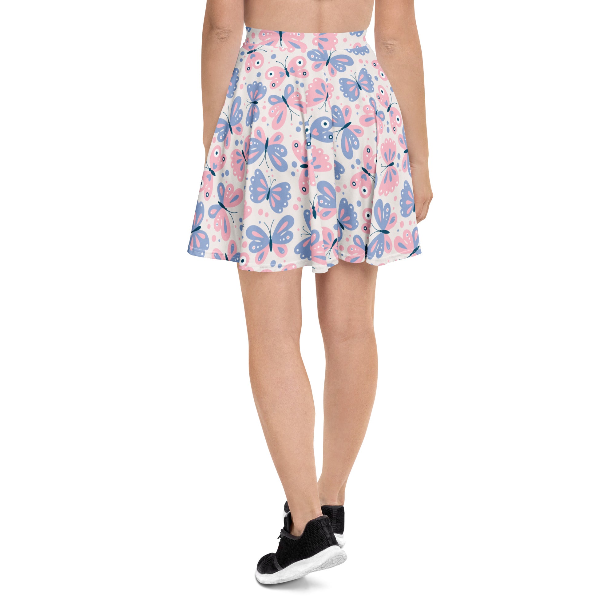 Women’s butterfly print skater skirt with pink and blue butterflies on light recycled fabric and UPF 50 plus protection