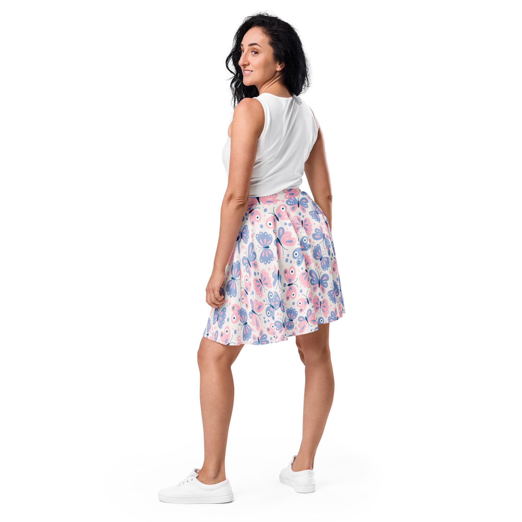 Women’s butterfly print skater skirt with pink and blue butterflies on white lightweight recycled fabric with upf 50+