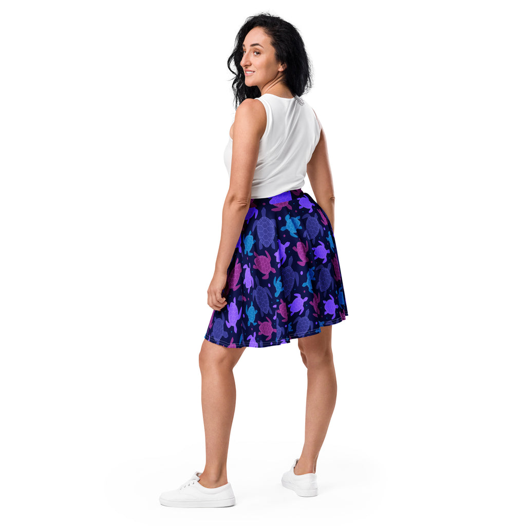 Women’s purple sea turtle skater skirt with flared vibrant turtle pattern in purple blue pink on dark navy recycled fabric