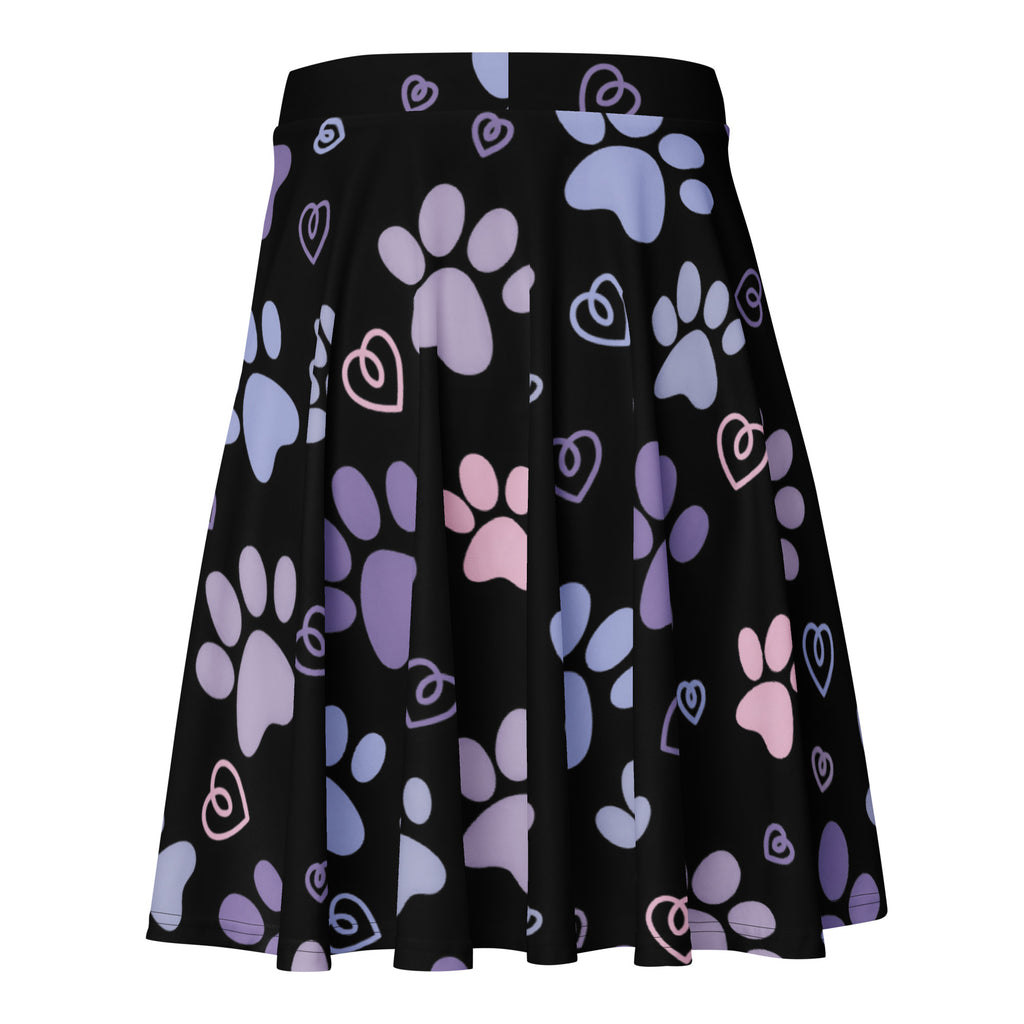 Black pleated women’s skater skirt with pastel paw prints and hearts made from recycled fabric with upf 50+ protection
