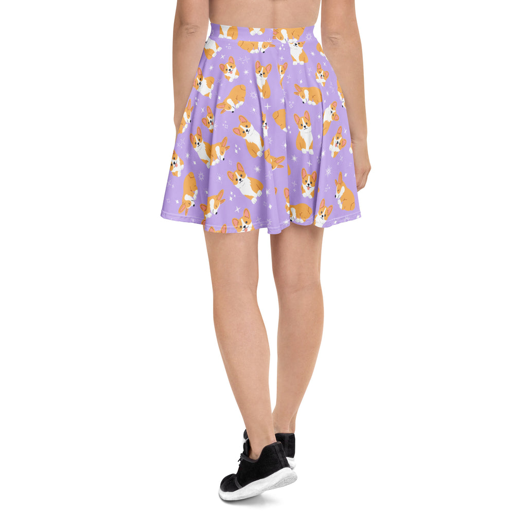 Women’s purple corgi dog skater skirt with playful orange and white corgi pattern, pleated flowy high waisted fabric