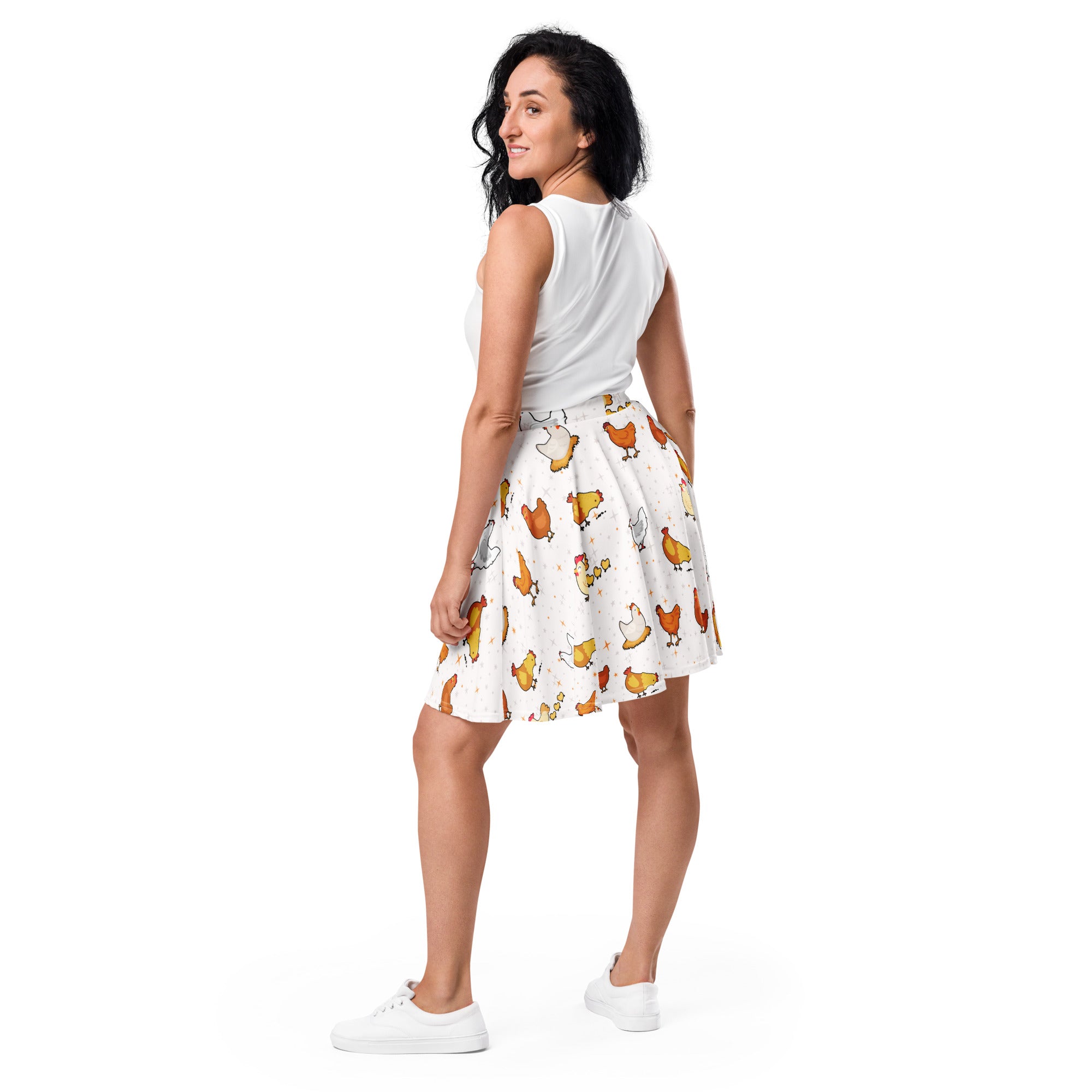White skater skirt with playful orange yellow and white cartoon chickens made from recycled fabric with upf 50+ protection