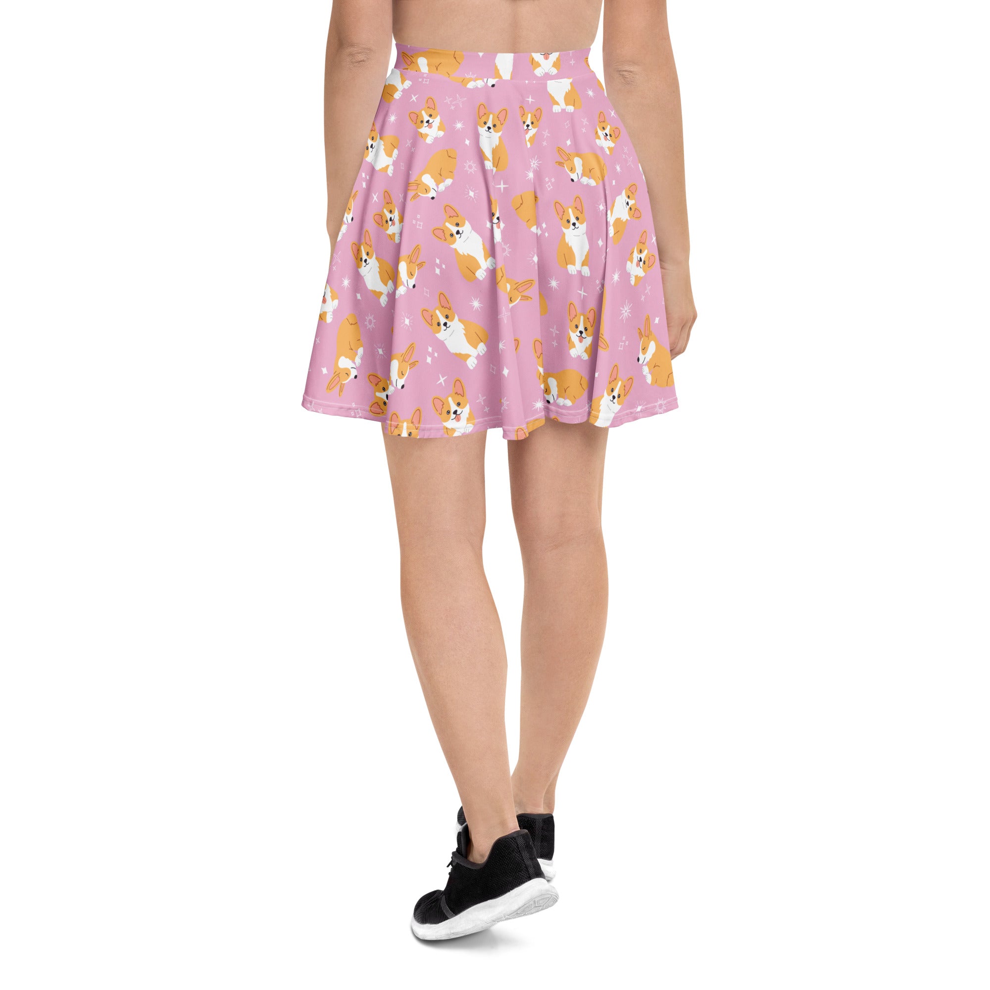 Women’s pink corgi dog skater skirt with playful orange and white corgi pattern and upf 50 plus recycled fabric