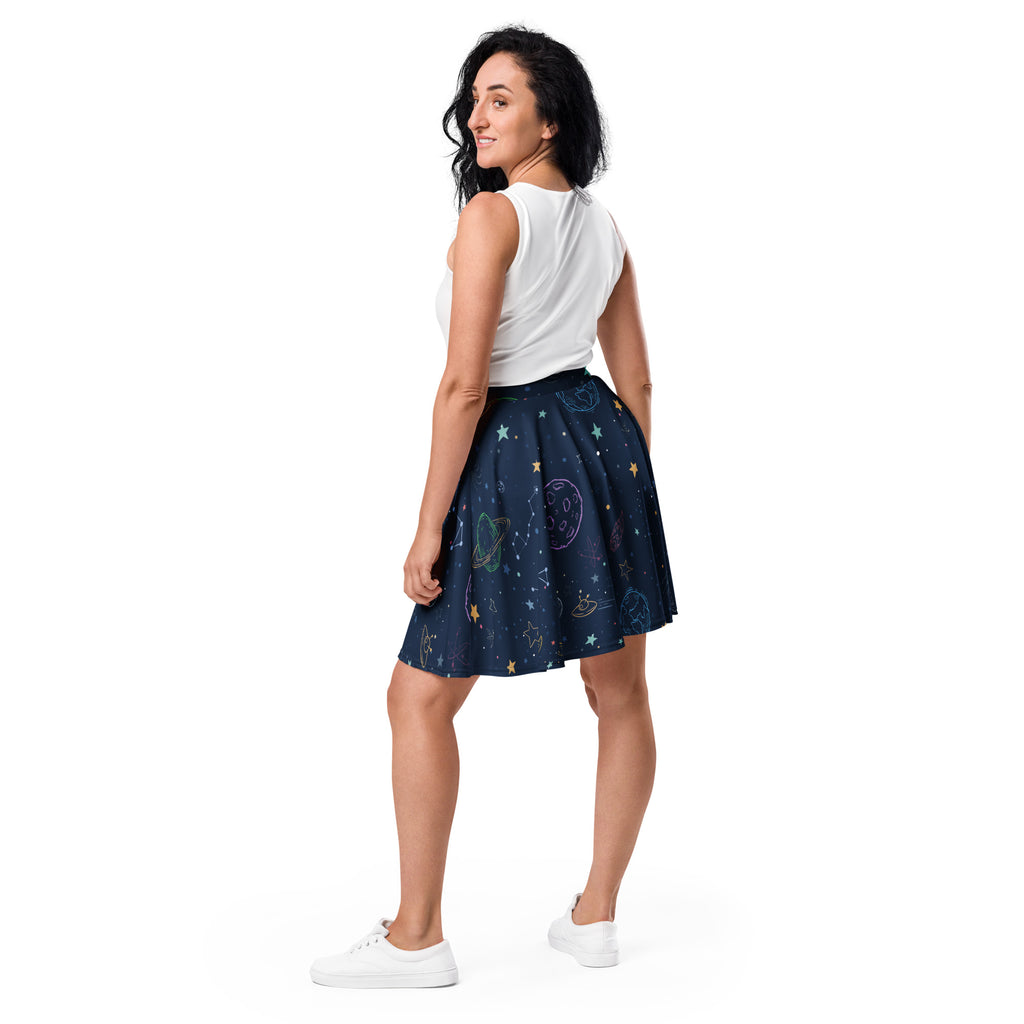 A navy blue women’s colorful galaxy space skater skirt with pastel celestial print flowy high waisted recycled fabric