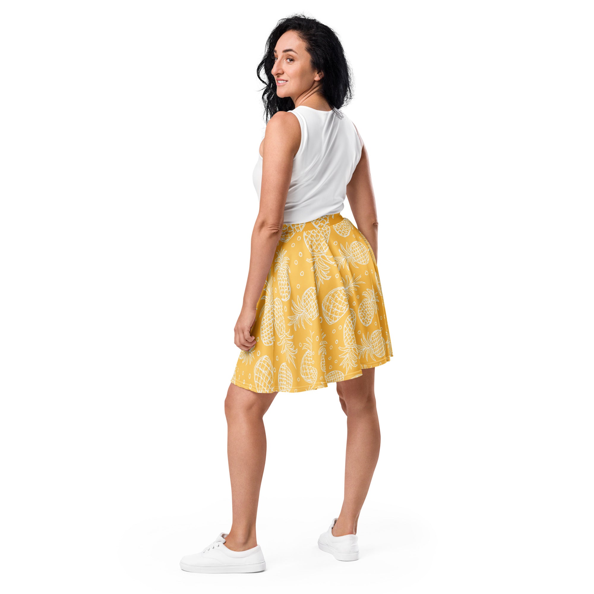 Yellow women’s pineapple skater skirt with white pattern flowy high waisted made from recycled fabric with UPF 50+