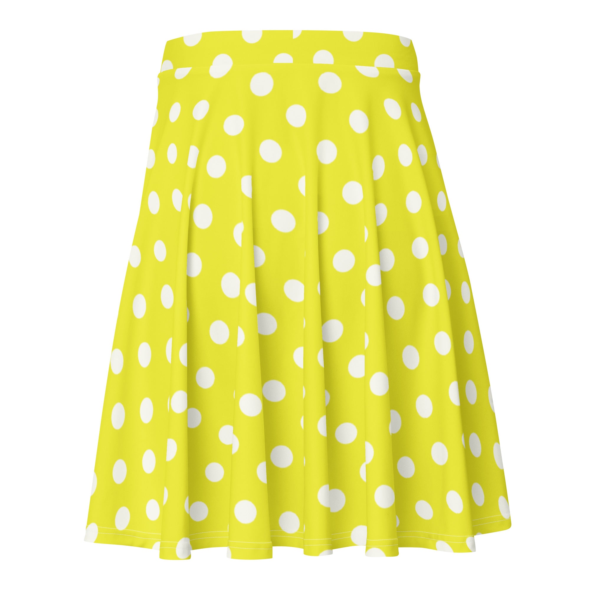 A vibrant yellow pleated women’s skater skirt with white polka dots made from recycled fabric with UPF 50+ protection