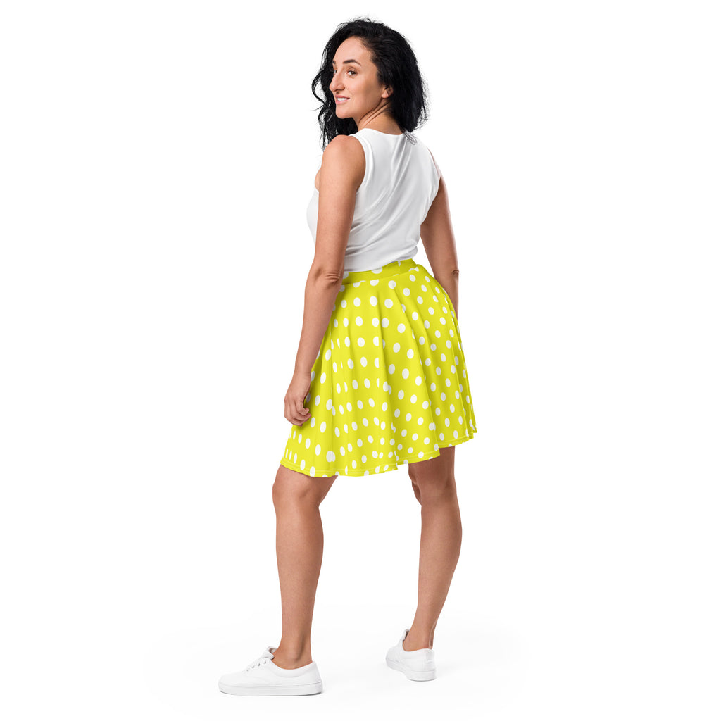 Women’s bright lime green pleated skater skirt with white polka dots made from recycled fabric with UPF 50 plus protection