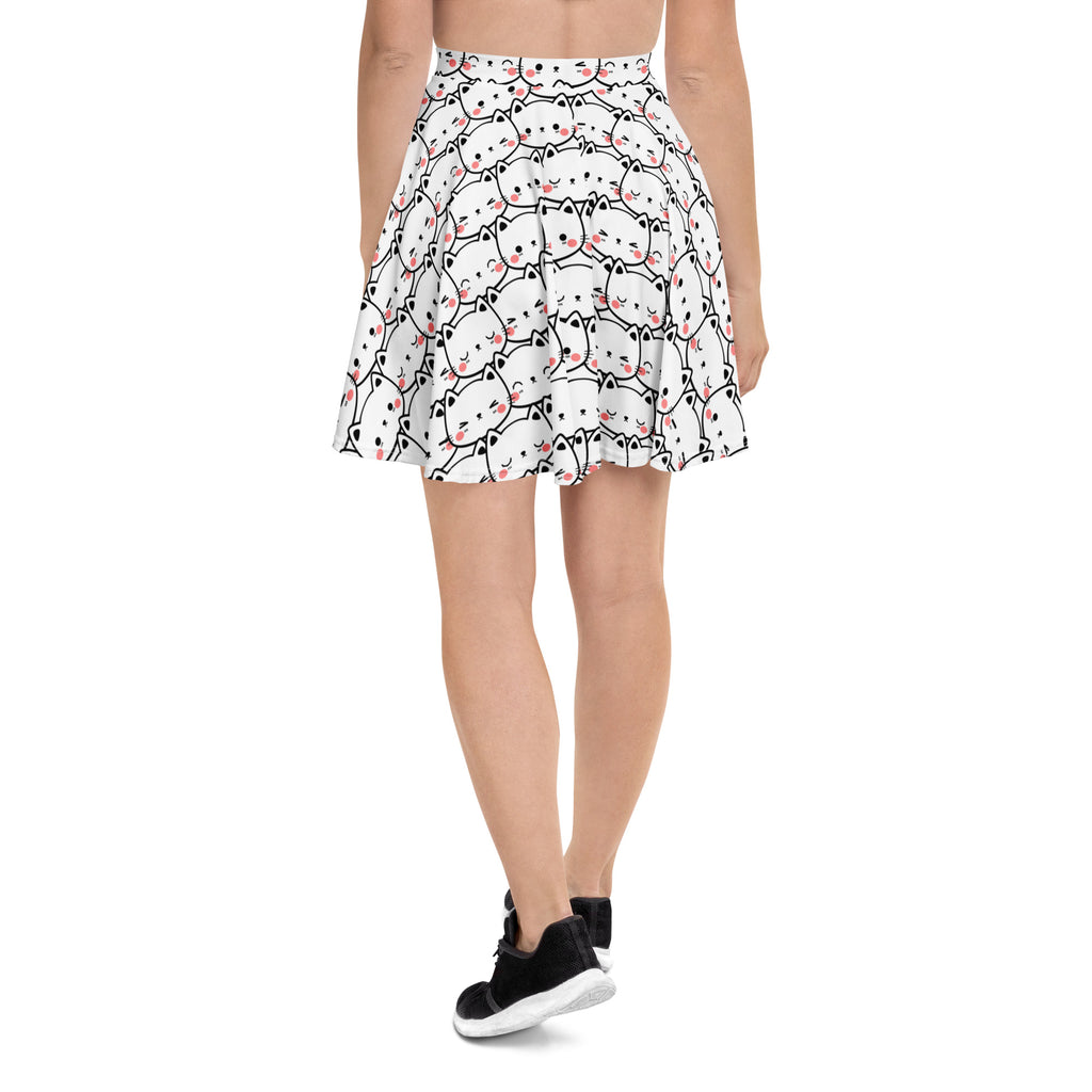 Women’s white pleated cat print skater skirt with black outlines pink cheeks flowy high waisted recycled fabric upf 50+