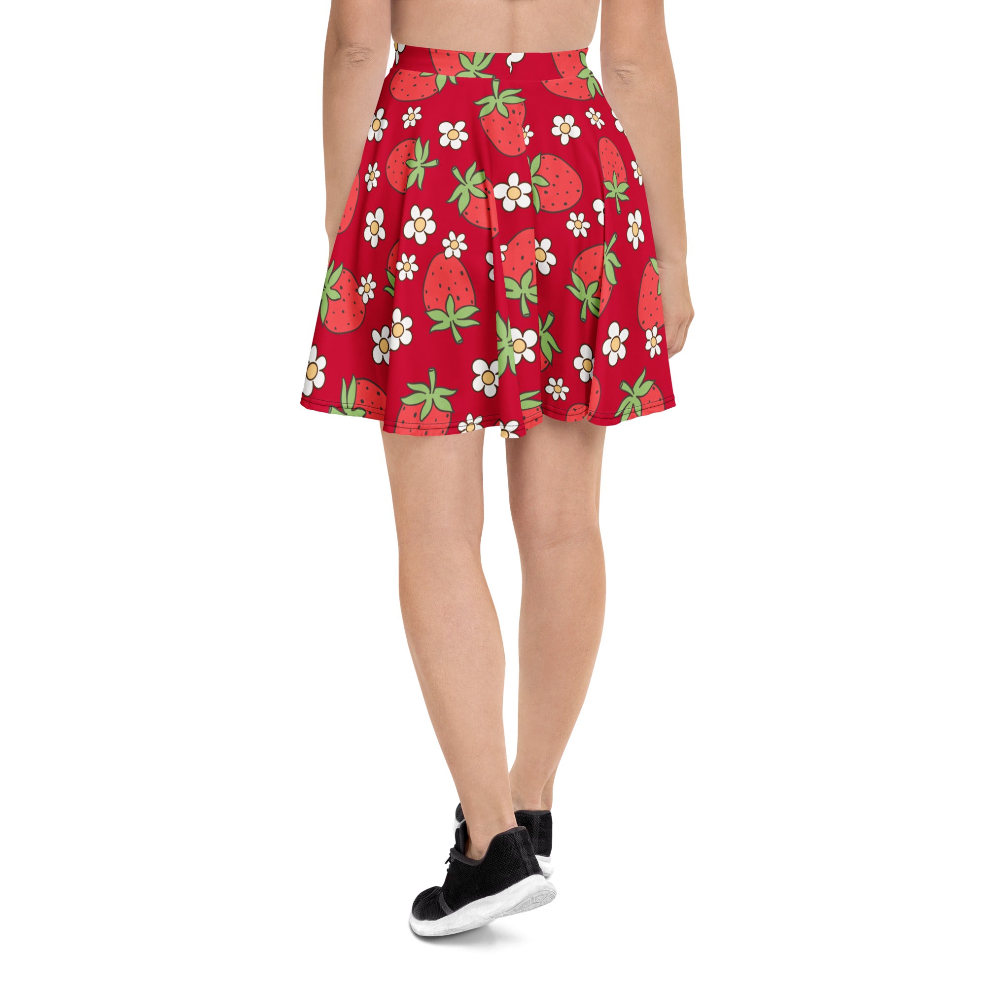 A vibrant red women’s skater skirt with strawberries white flowers flowy high waisted UPF 50 plus recycled fabric