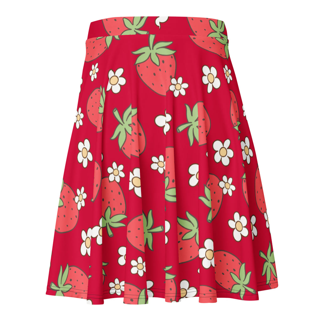 A vibrant red high waisted skater skirt with cartoon strawberries white daisies flowy fabric and UPF 50 plus protection