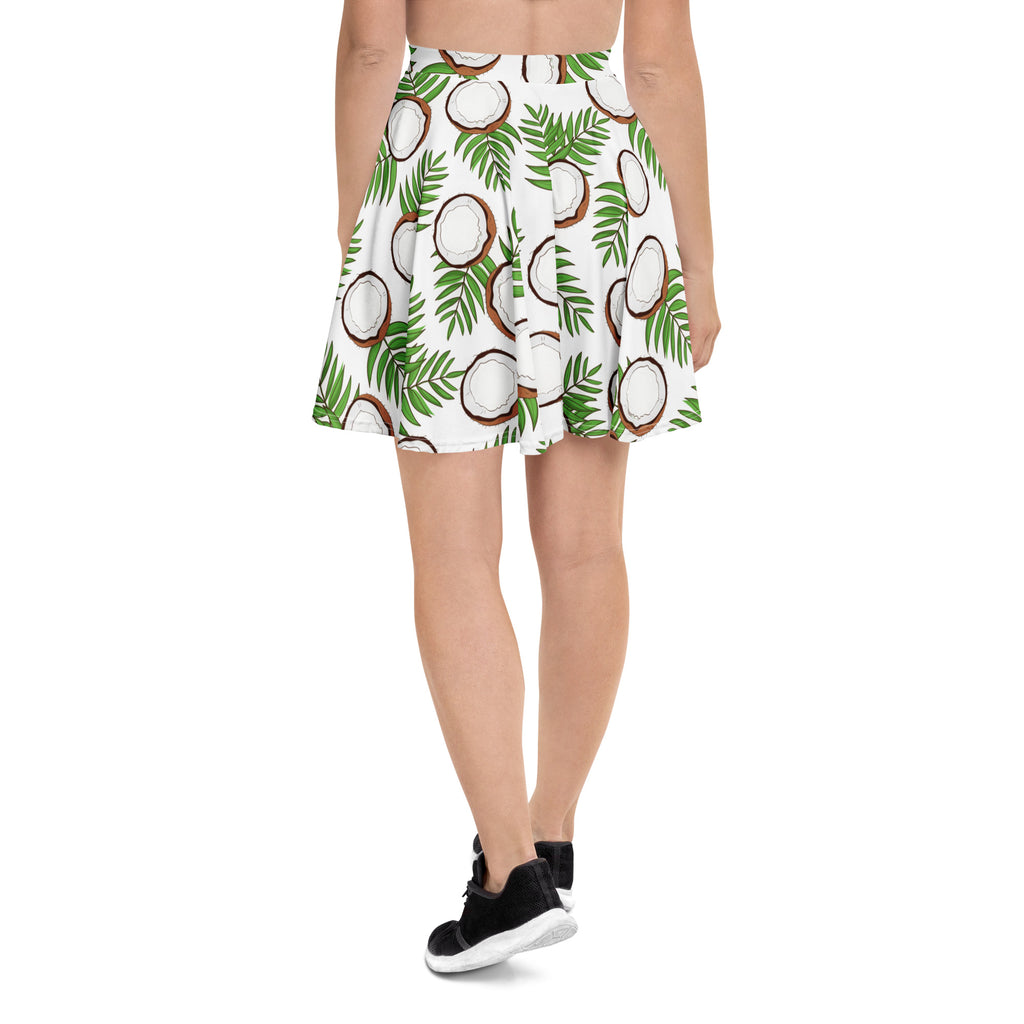White pleated skater skirt with vibrant coconut and palm leaf pattern flowy high waisted UPF 50 plus recycled fabric