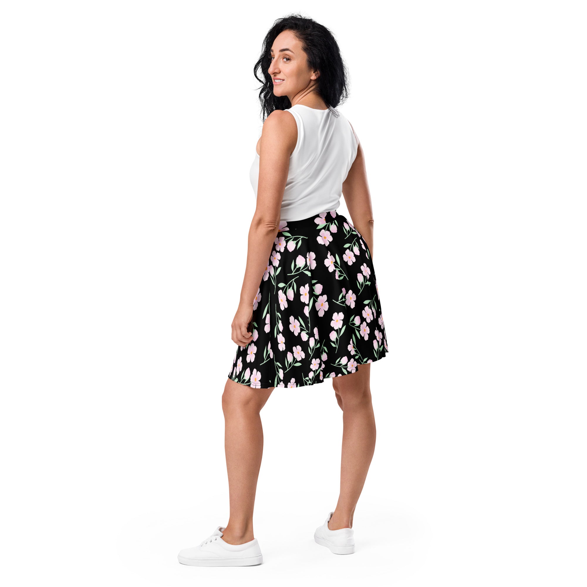 Women’s black floral skater skirt with pink flowers green stems flared silhouette flowy high waisted upf 50 recycled fabric