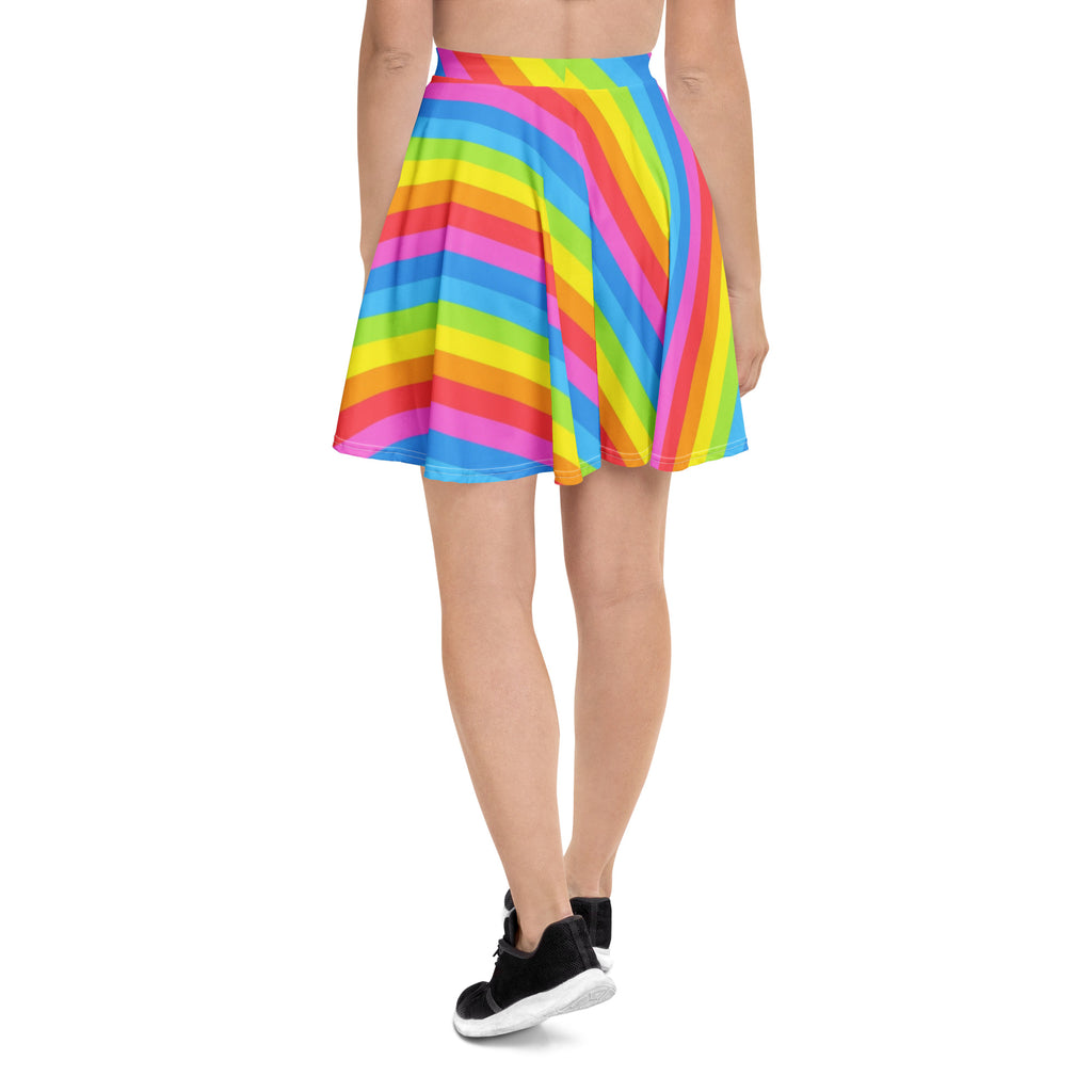 Women’s rainbow stripe skater skirt with vibrant diagonal pleats in recycled fabric and UPF 50 plus protection