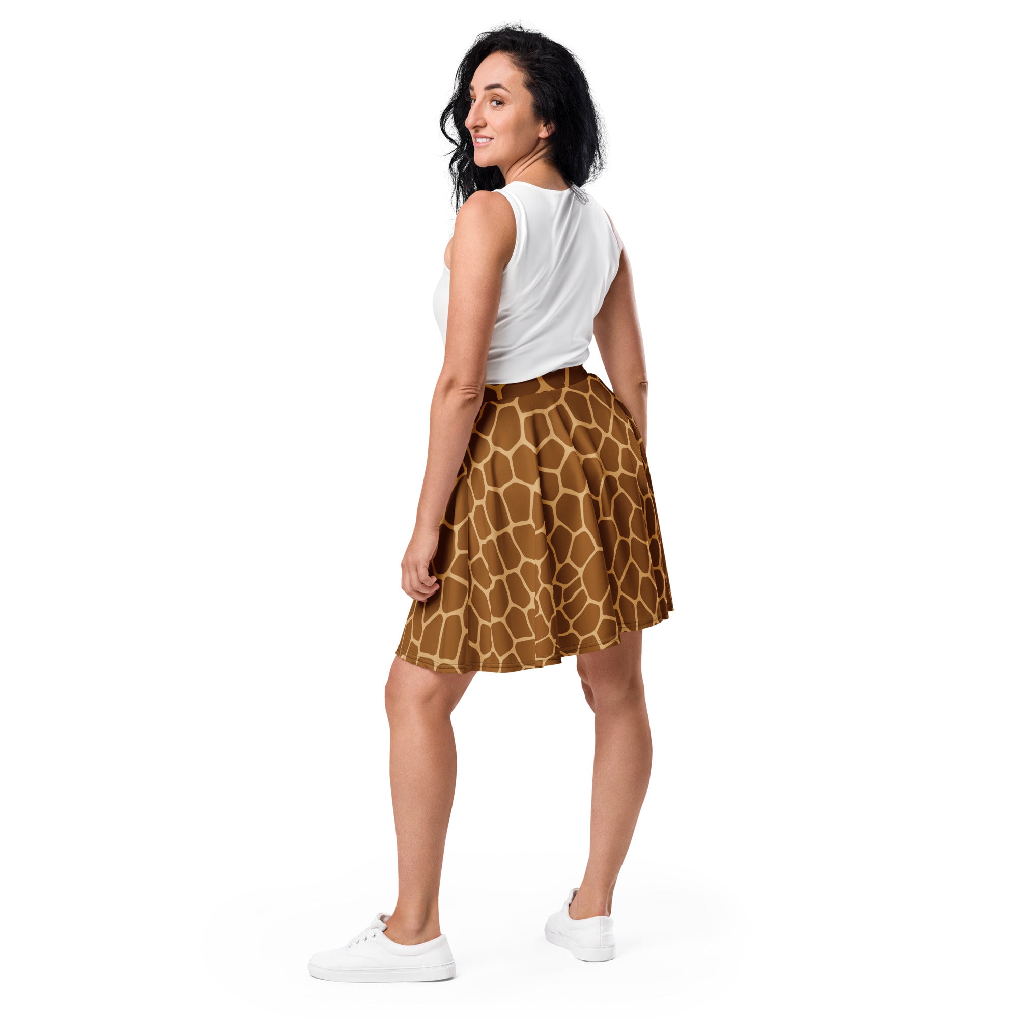 A flared knee-length womens skater skirt with a bold giraffe print in brown and tan made from recycled fabric