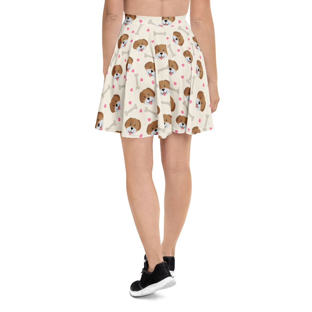 Women’s cute dog print skater skirt in cream fabric with brown dog faces pink hearts and light gray bones